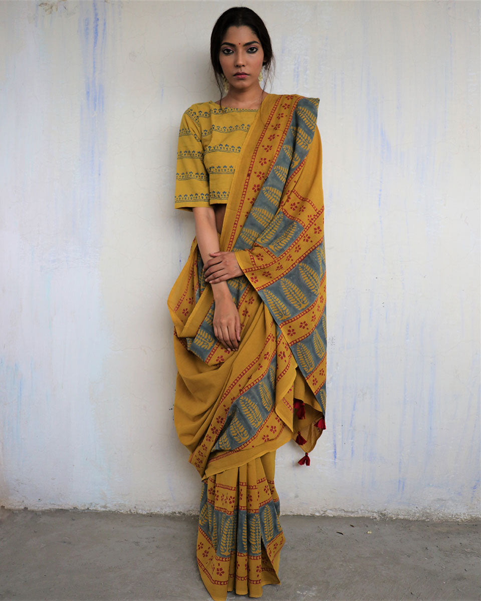 Chidiyaa Mustard Block Printed Cotton Mul Saree God with Unstitched Blouse