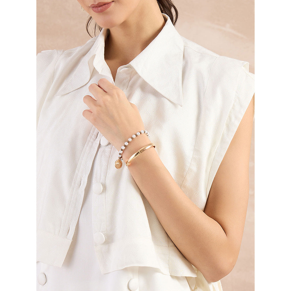 First Resort by Ramola Bachchan White Sleeveless Bib Cover-Up With Side Straps Overlay