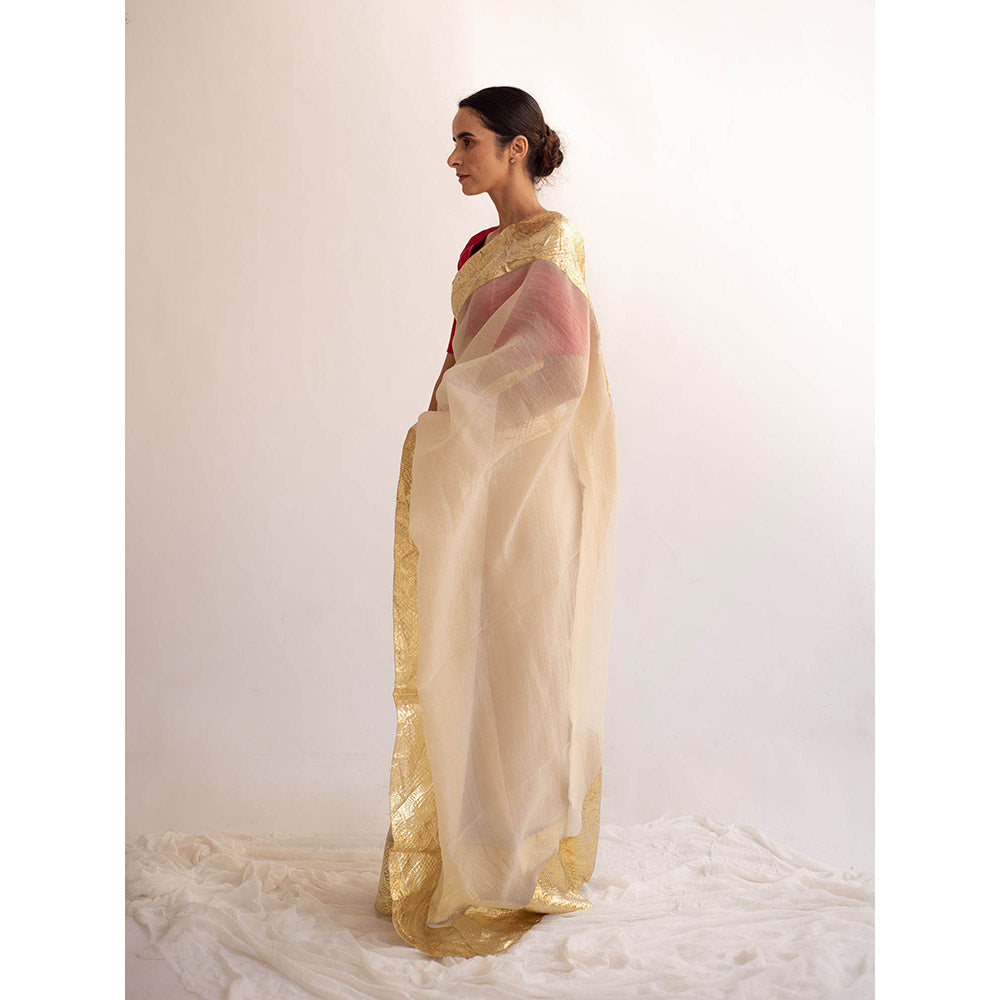 KAPARDARA A Pure Silk Organza Saree In The Shade Of Cream Handcrafted With Gold Lampe Border