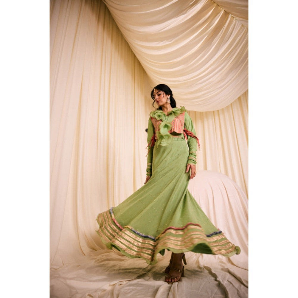 Leela by A Green Blouse With Ruffled Neck Along With Peach Bib And Fully Highlighted Lehenga