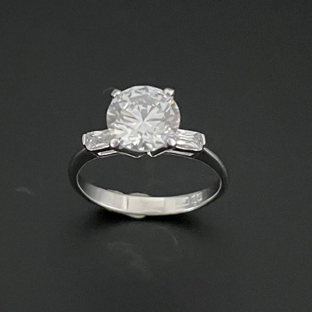 Mon Tresor White 2 Carat Solitaire Flanked By Baguette Diamonds With Plain Band Ring