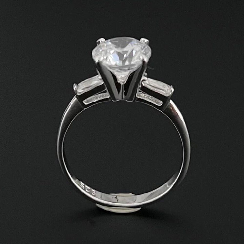 Mon Tresor White 2 Carat Solitaire Flanked By Baguette Diamonds With Plain Band Ring