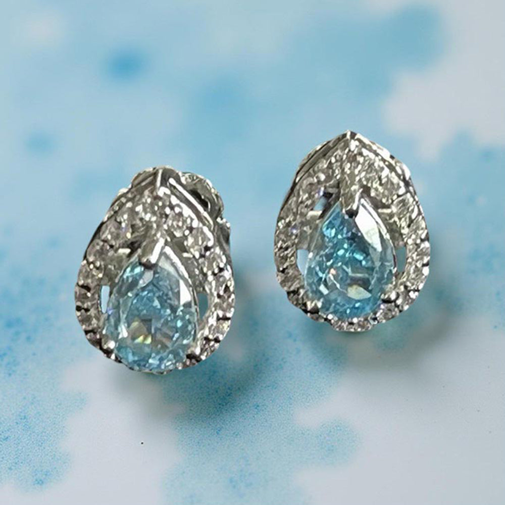 Mon Tresor Aqua Marine Pear Shaped Studs With Dia Halo