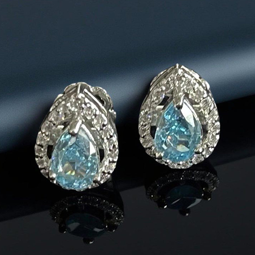 Mon Tresor Aqua Marine Pear Shaped Studs With Dia Halo