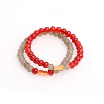 Suhani Pittie Gold Plated Oval Motif With Red & Grey Glass Beads Distance Bracelet (Set Of 2)