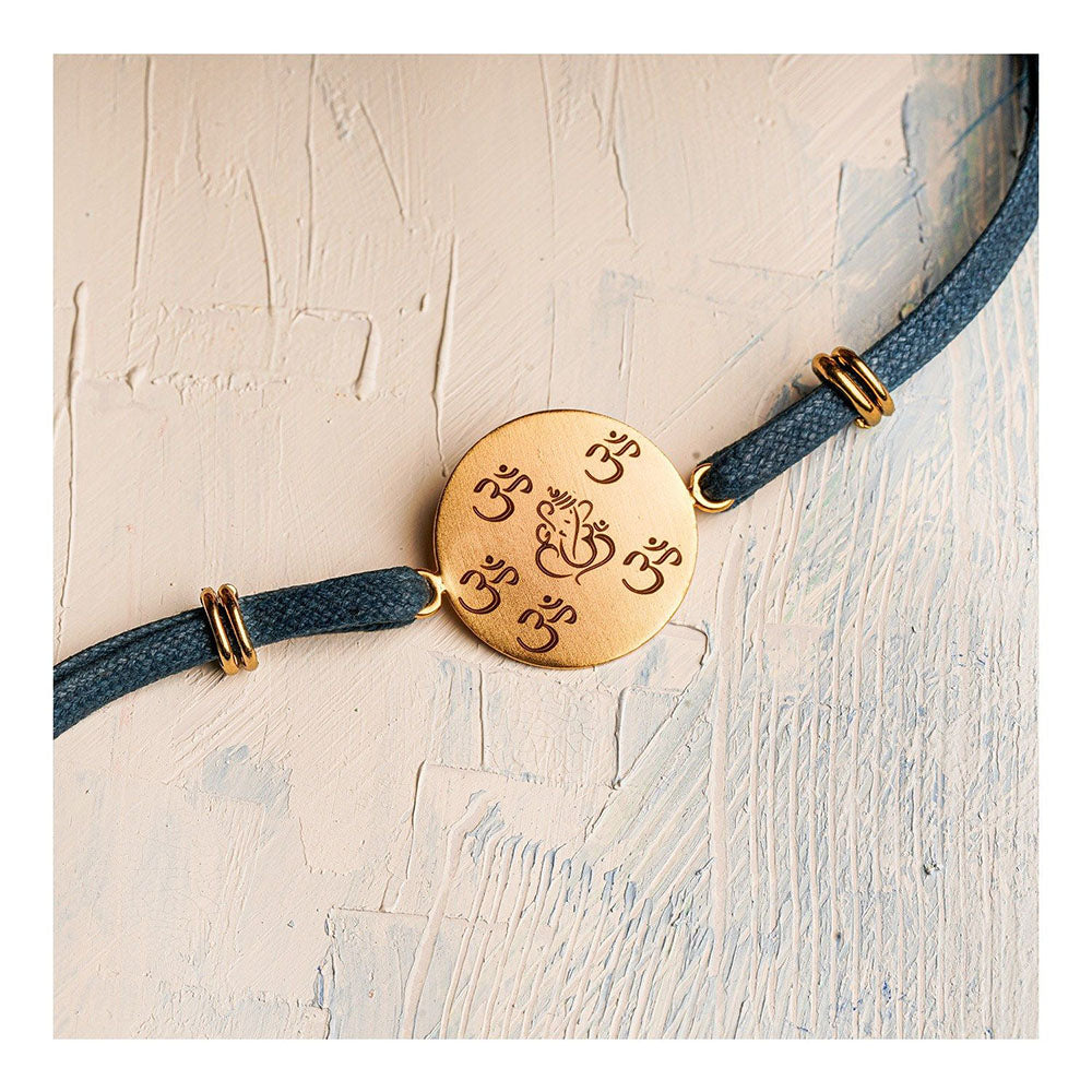 Suhani Pittie Laser Om & Ganeshji Rakhi Disc with Denim Thread (22k Gold Plated)