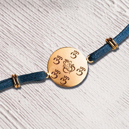 Suhani Pittie Laser Om & Ganeshji Rakhi Disc with Denim Thread (22k Gold Plated)