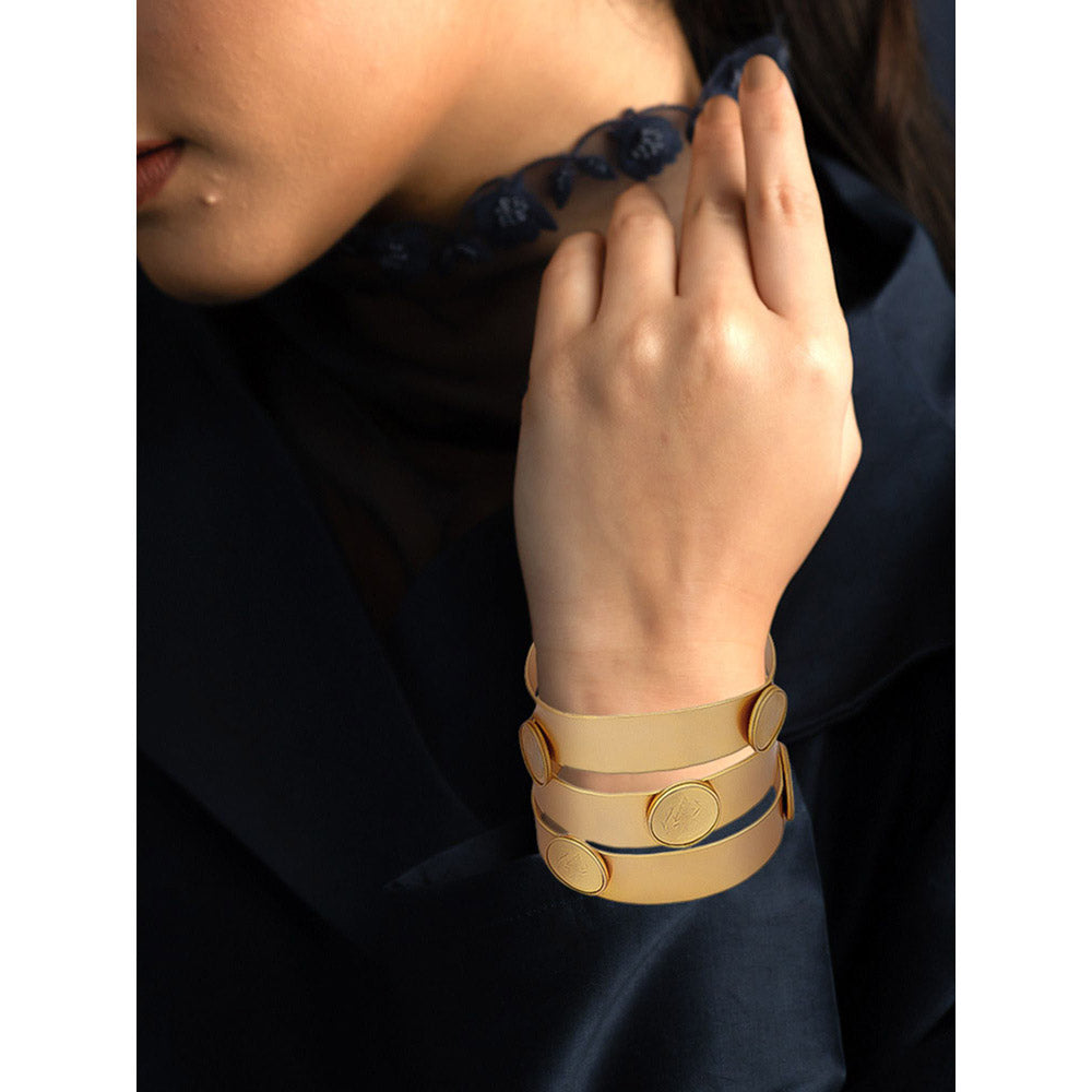 Suhani Pittie Gold triad coin hand cuff