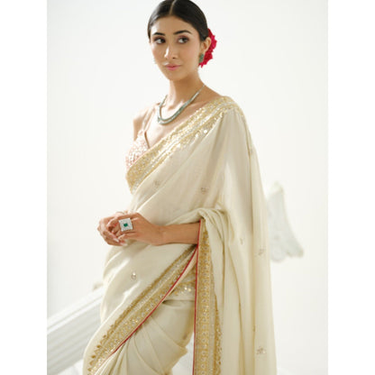 Tamaraa by Tahani Melisma White tissue Saree with Stitched Blouse