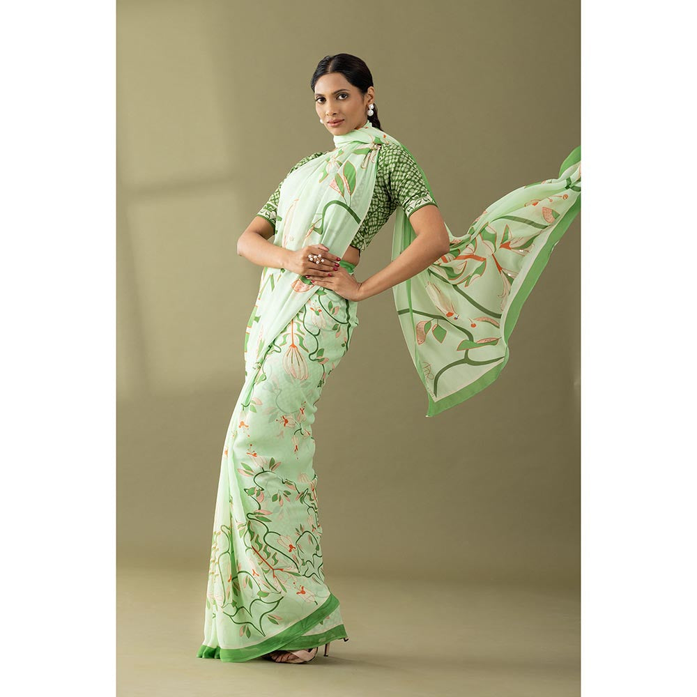 Thee Modern Roots Pastel Green Printed and Embroidered Georgette Saree with Unstitched Blouse