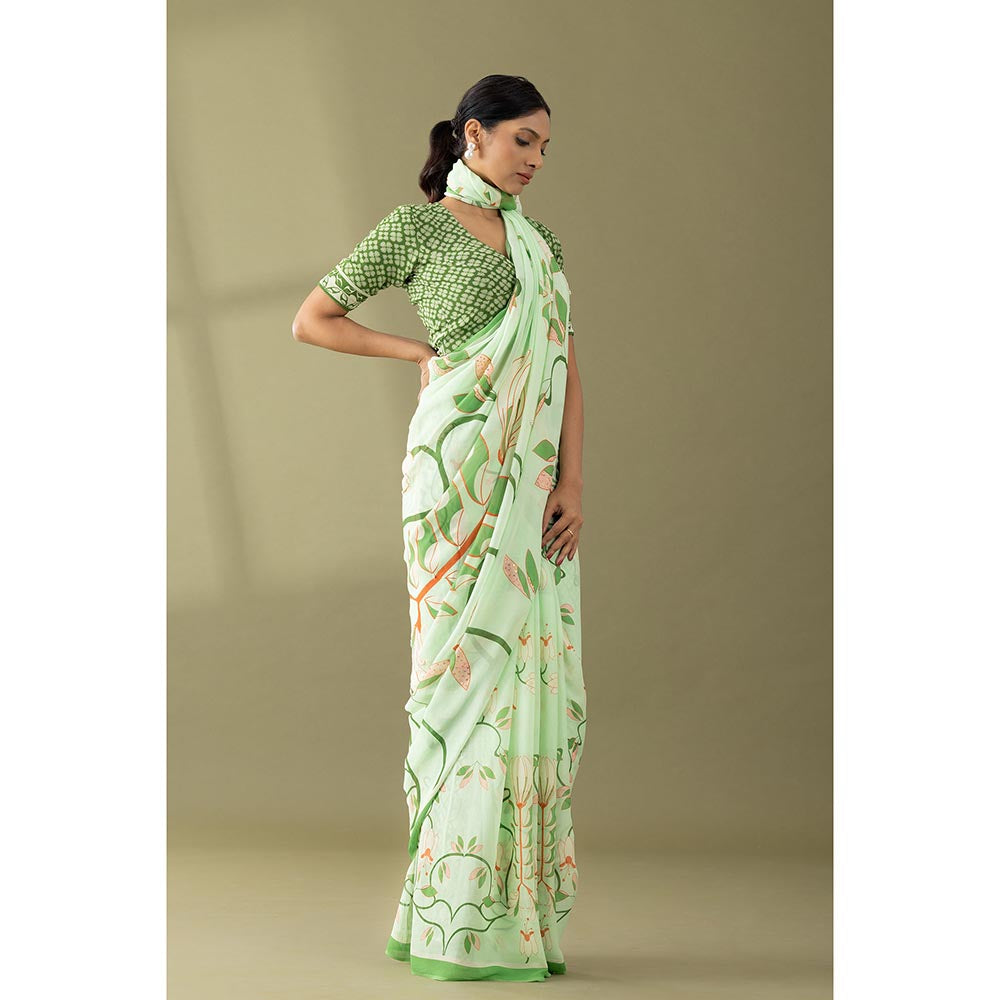 Thee Modern Roots Pastel Green Printed and Embroidered Georgette Saree with Unstitched Blouse