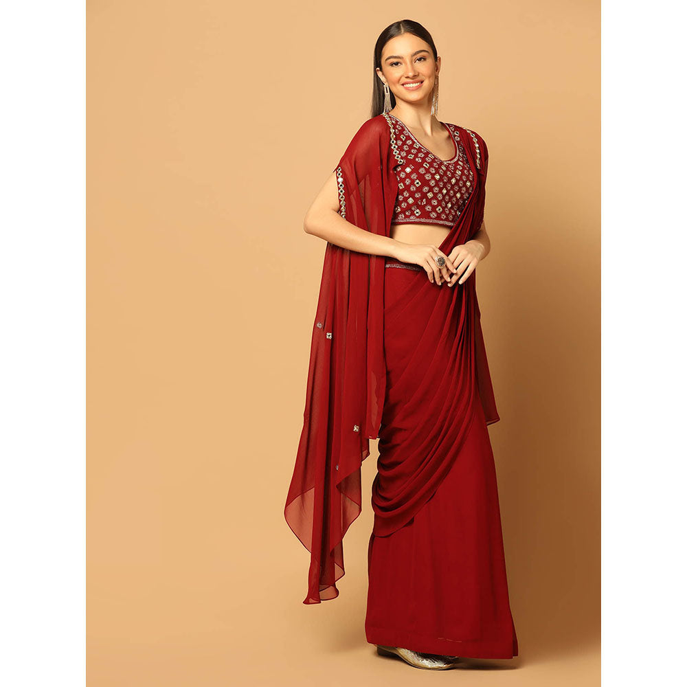 "Two Sisters" by Gyans Maroon Draped Saree with Stitched Blouse and Cape