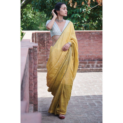Dressfolk multi toned handwoven yellow saree with detailed jamdani work and silver zari buttas.