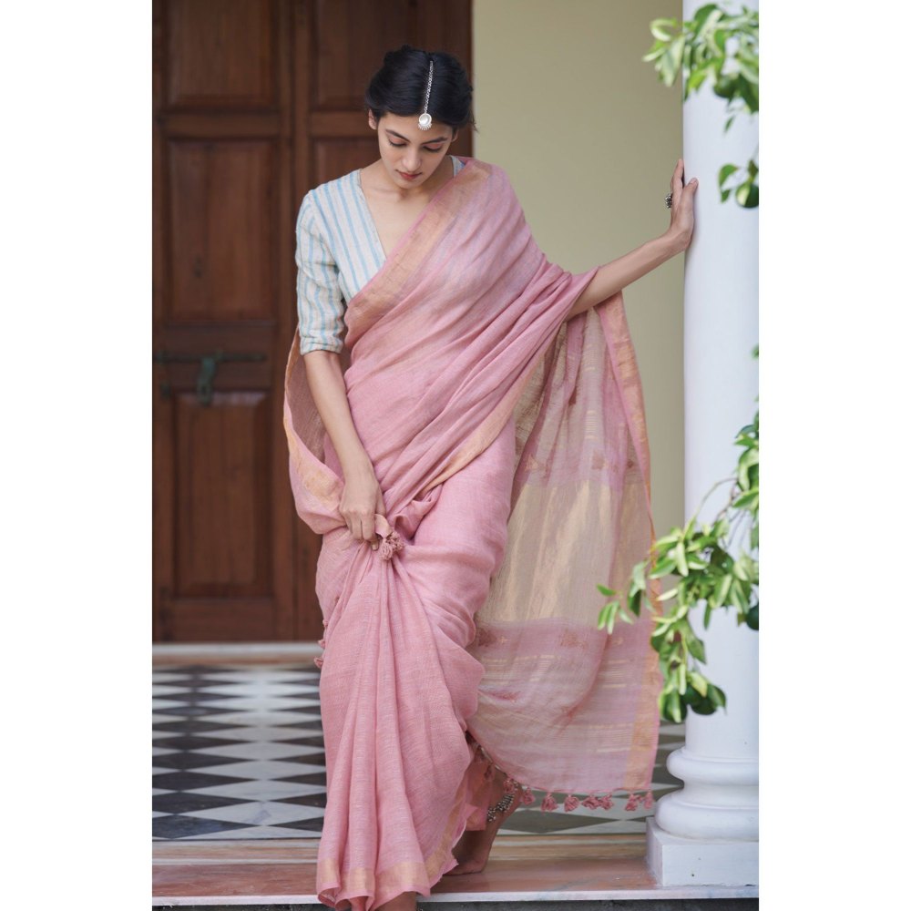 Dressfolk dust rose handwoven linen saree with subtle gold zari details