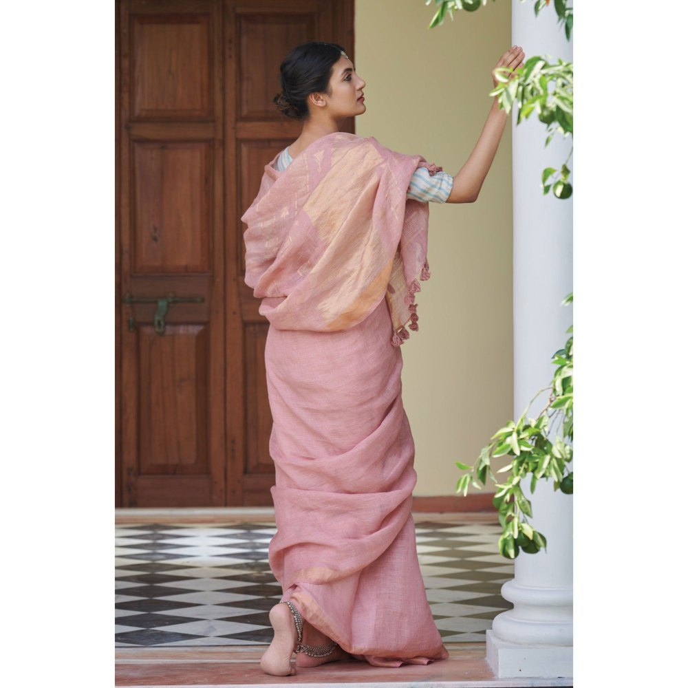 Dressfolk dust rose handwoven linen saree with subtle gold zari details